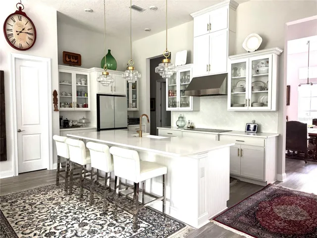 You would love this kitchen, White quartz huge island, farm sink, glass front fridge, all other appliances are LG.