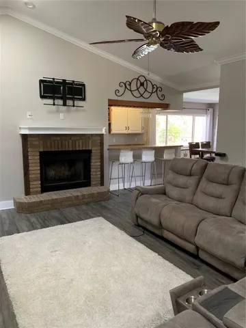 Family room with wood burning fireplace