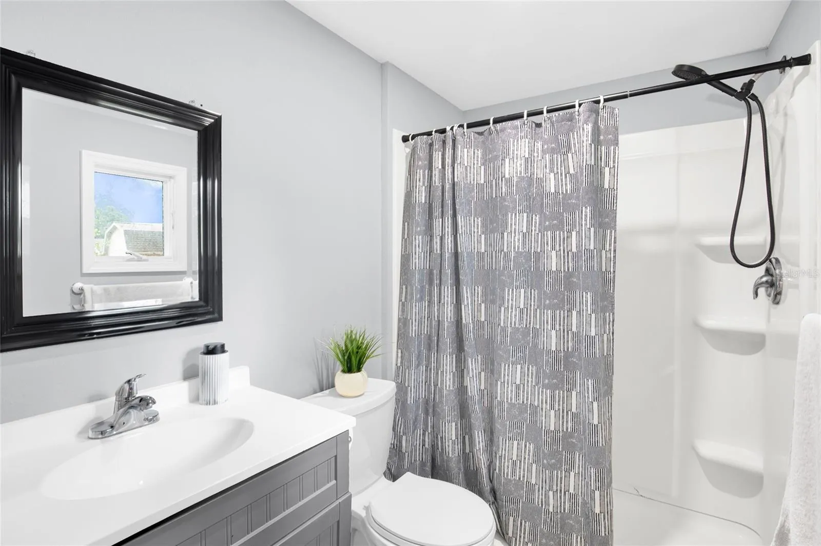 Primary Bath in Downstairs Unit 2/2