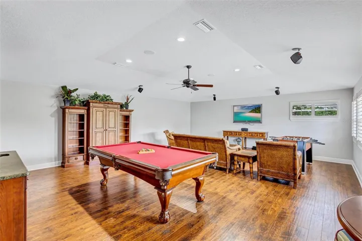 Expansive bonus room with wet bar and full bathroom