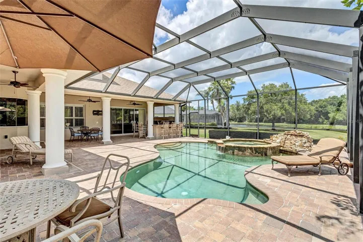 gorgeous pool patio, outdoor kitchen and stunning views