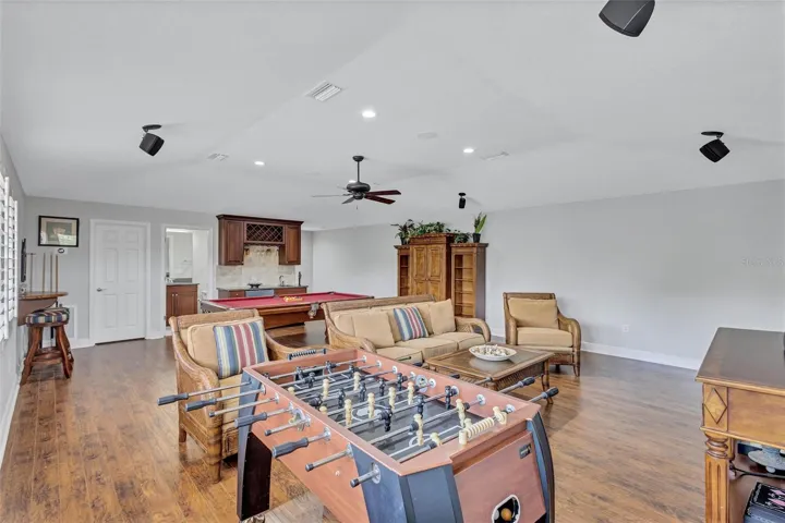 Expansive bonus room with wet bar and full bathroom
