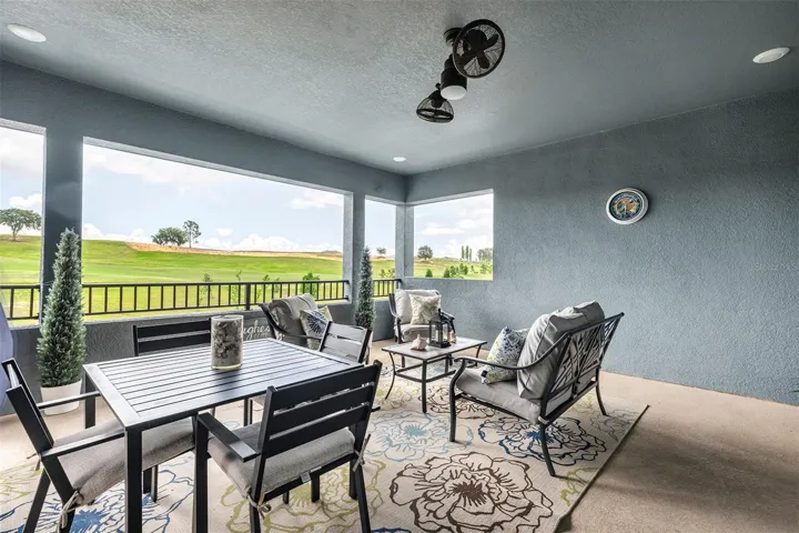 Upstairs covered porch overlooking golf course