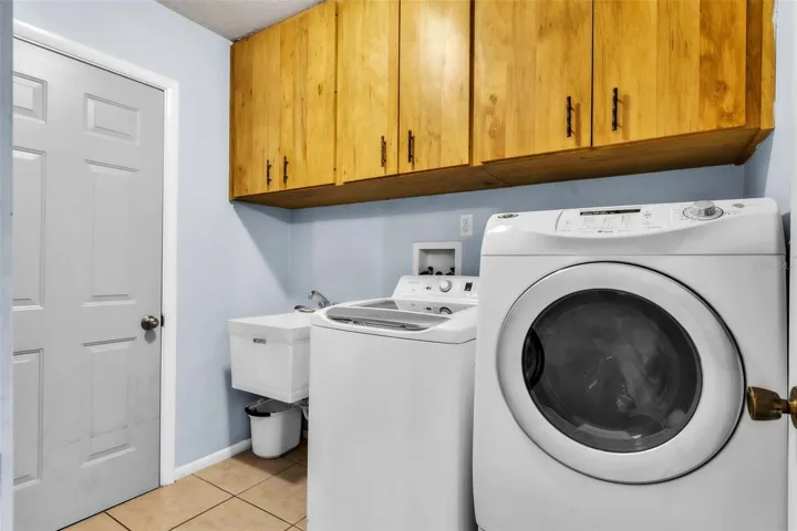 Inside laundry leads to garage