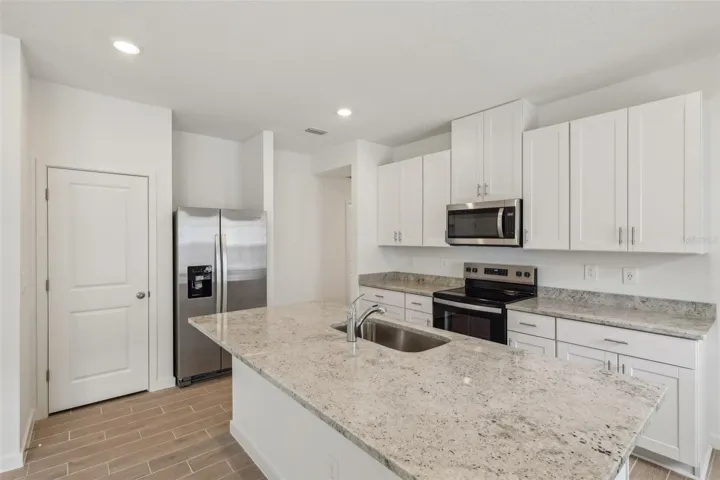 The interior photos are of another home with the same floor plan and interior finishes. Some details may vary