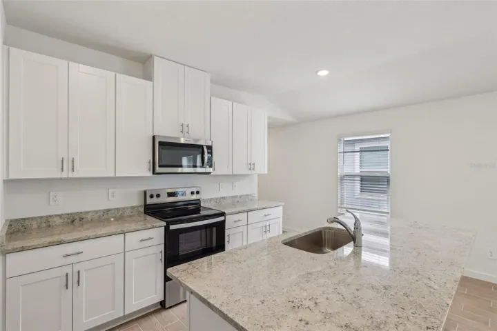 The interior photos are of another home with the same floor plan and interior finishes. Some details may vary
