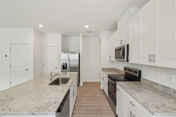The interior photos are of another home with the same floor plan and interior finishes. Some details may vary