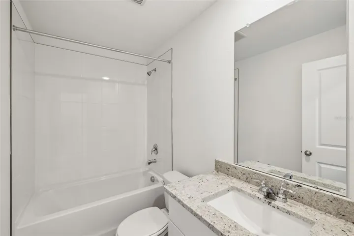 The interior photos are of another home with the same floor plan and interior finishes. Some details may vary