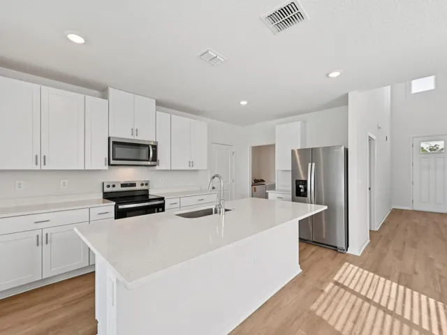 Interior photos are not of the actual home but are photos of the builder home with the same floorplan with similar interior finishes and features.