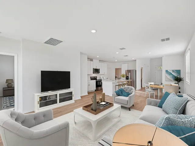 Interior photos are not of the actual home but are photos of the builder home with same floorplan with similar interior finishes and features. Photo uses virtual staging.