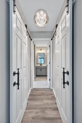 Primary En Suite Bathroom with Dual Walk-In Custom Built Closets