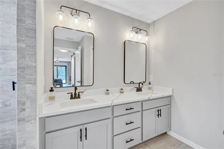 Primary Bathroom with Dual Sinks & Quartz Countertops