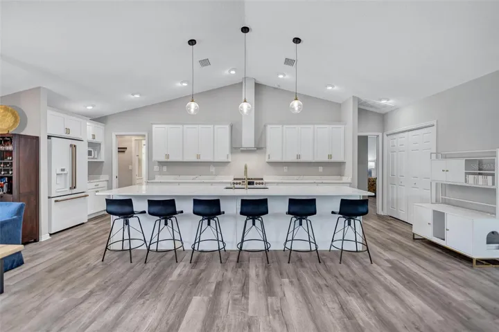 Gourmet Kitchen featuring Gorgeous Quartz Countertops & Massive 12ft Island - Perfect for Cooking & Entertaining