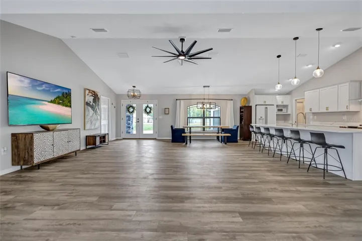 Bright & Airy Featuring Soaring Ceilings & Vinyl Plank Flooring