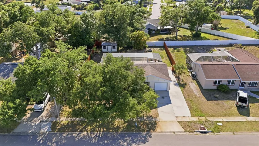 One car garage and added parking slab on right!