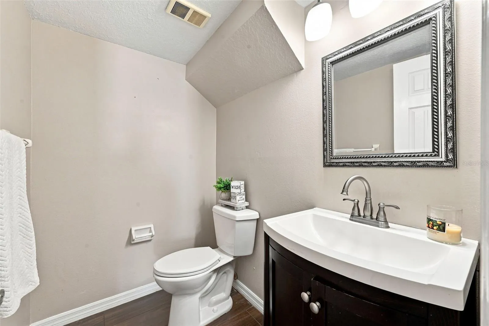 under stair half bath convenient for guests