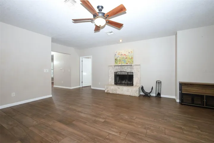 Family Room with Wood Burning Fireplace