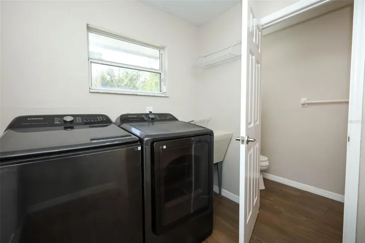 Downstairs Laundry Room with Pantry and Half Bath for pool bath access