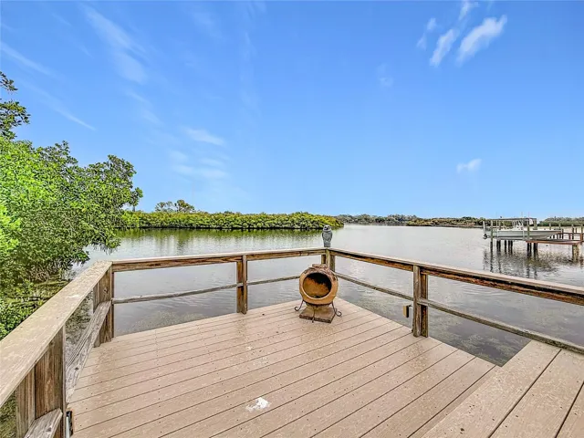 Welcome to your own slice of paradise—a charming dock that beckons you to unwind and embrace the tranquility of nature. Picture yourself here, reflecting on the day, as gentle waves lap against the shore; it's the perfect oasis to soothe your soul and reconnect with the simple joys of life.