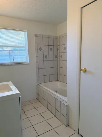 Full bathroom with tub