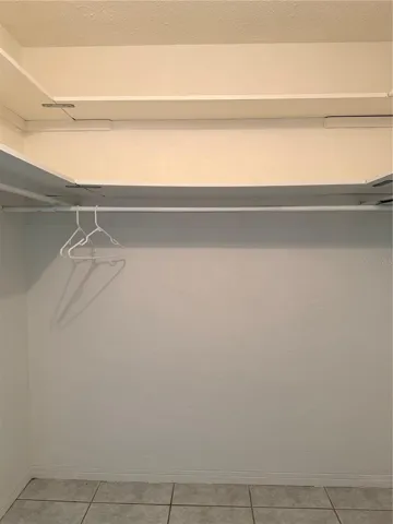 primary bedroom walk in closet