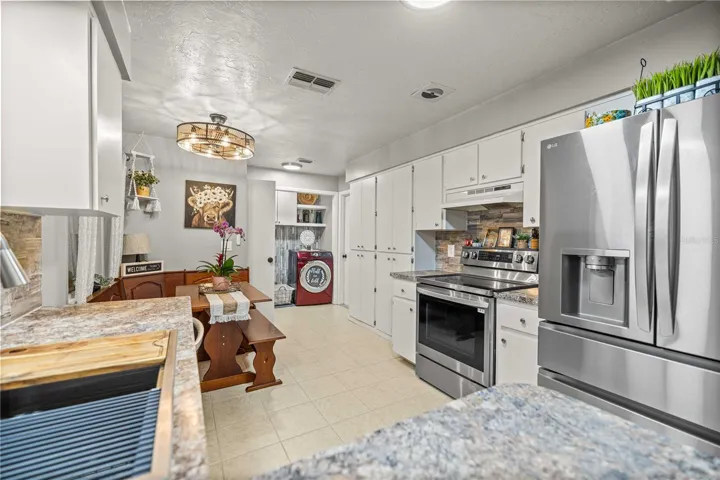 Kitchen _ Beautifully refreshed cabinets with updated hardware