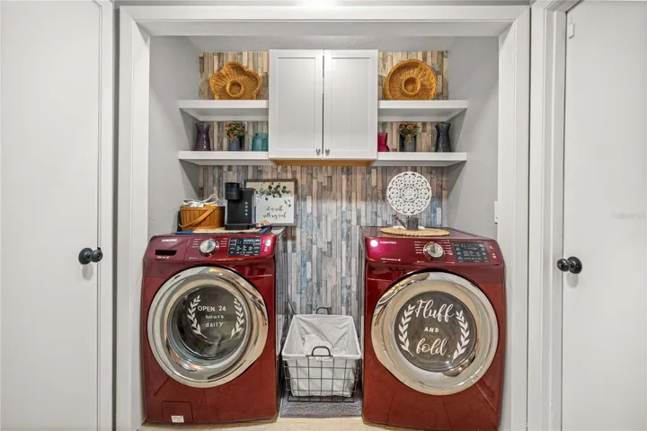 Inside laundry (door to left to 1/2 bath _ door to right to garage)