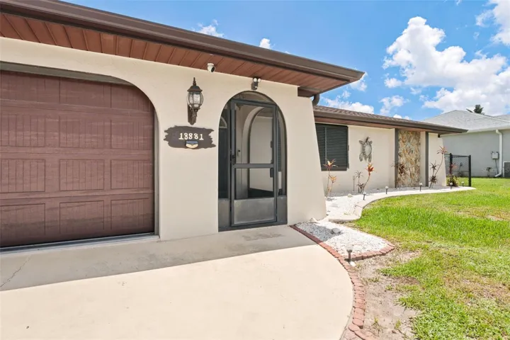 Charming Front Entry with Tropical Curb Appeal.
