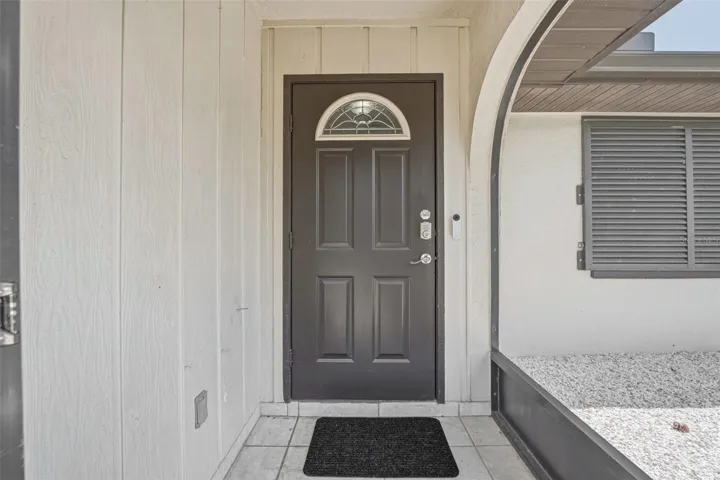 Welcoming Screened Front Entry.