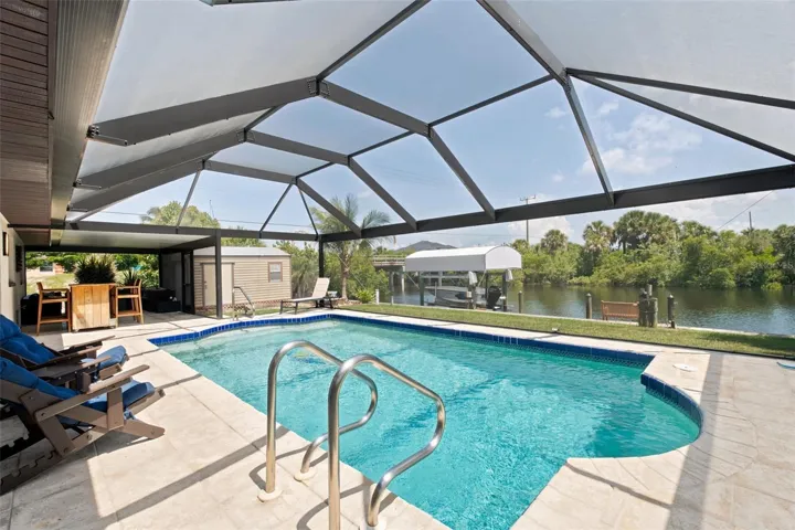 Resort Styled Heated Pool with New Pool Cage.