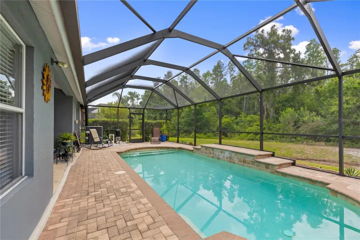 Private backyard with solar heated pool