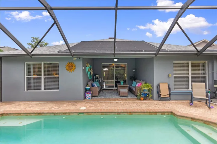 Private backyard with solar heated pool