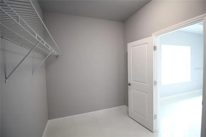 Walk-In Closet in Primary Bedroom