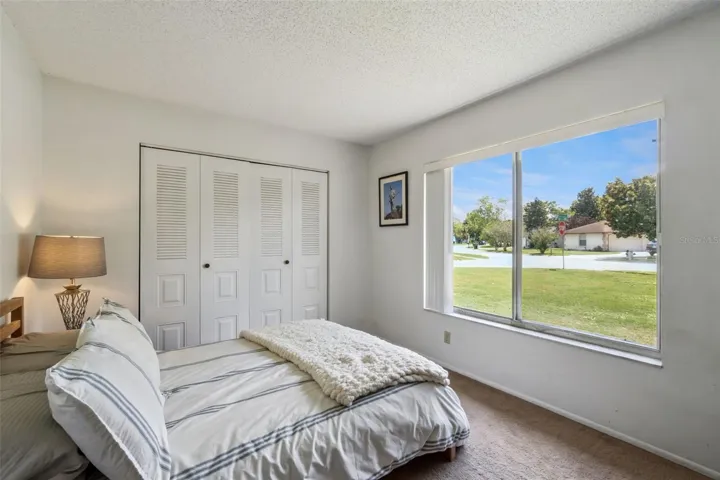 Third bedroom sits in the front of the house and has amazing light through this giant window.