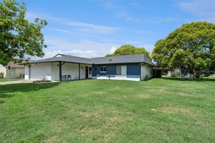 Corner lot location allows for lots of privacy and a nice shade tree to enjoy an afternoon ice-tea.