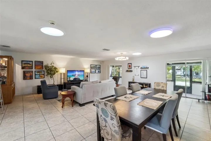 A nice view of the entire great room with 2 sets of sliders to the back porch.