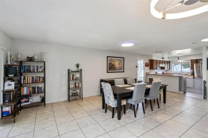 Dining space and views into the kitchen.  Amazing open great room space across from the living area.