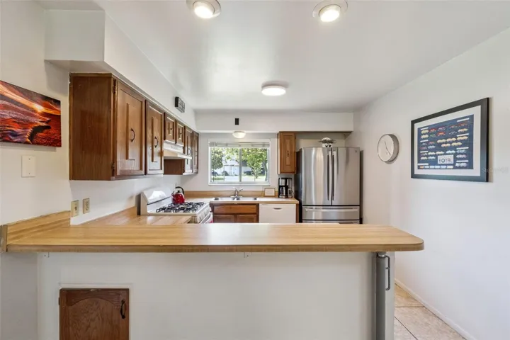 Plenty of counter space in this kitchen with extra storage spaces.