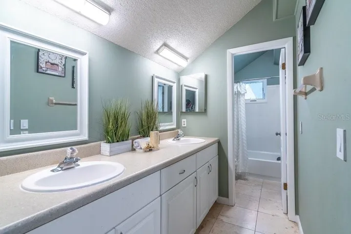3rd bath upstairs with a separate water closet and tub with shower combo