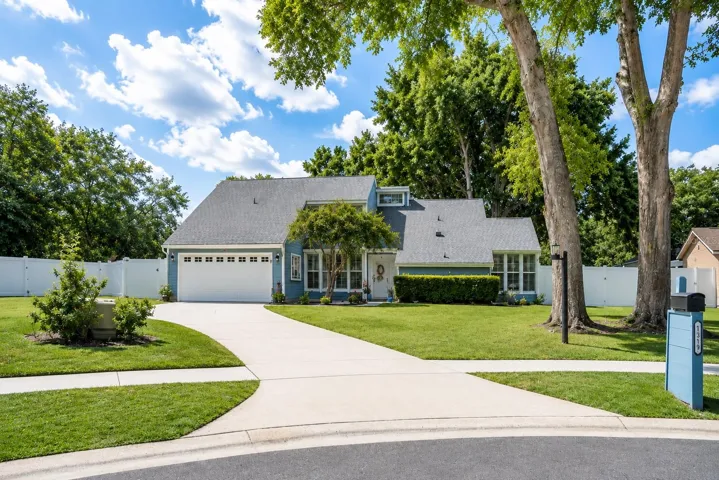 Sweeping long driveway accommodates up to 6 additional cars with ease.