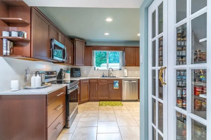 Custom build pantry under the stairs