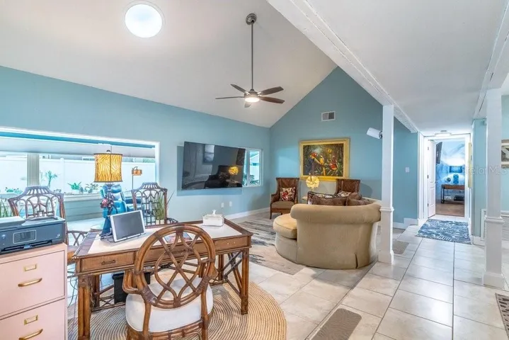 Family room seamlessly flows into the sunroom