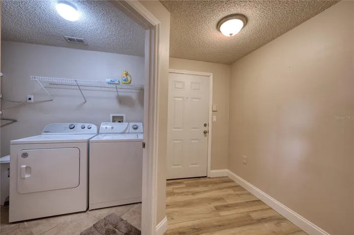 Full size washer and dryer in condo