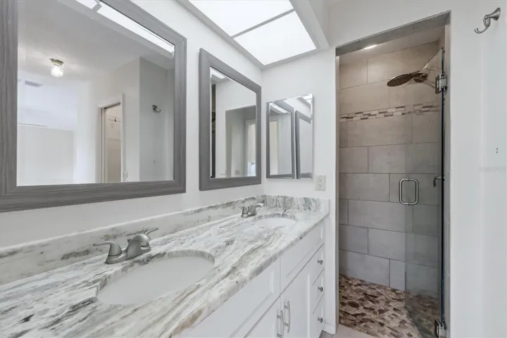 Primary bath with updated shower