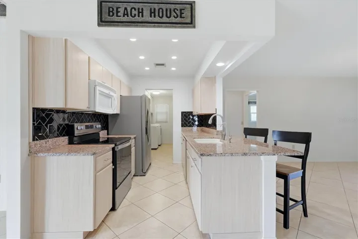 Kitchen opens to the living room & dining room