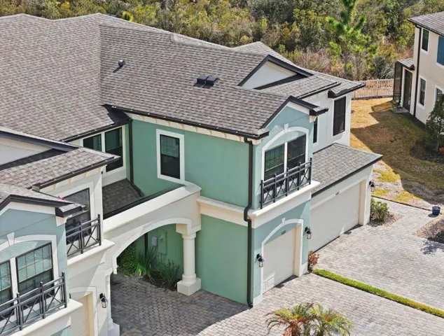 Beautiful Mediterranean Elevation - 1 car garage, driveway, plus additional parking across the street for guests