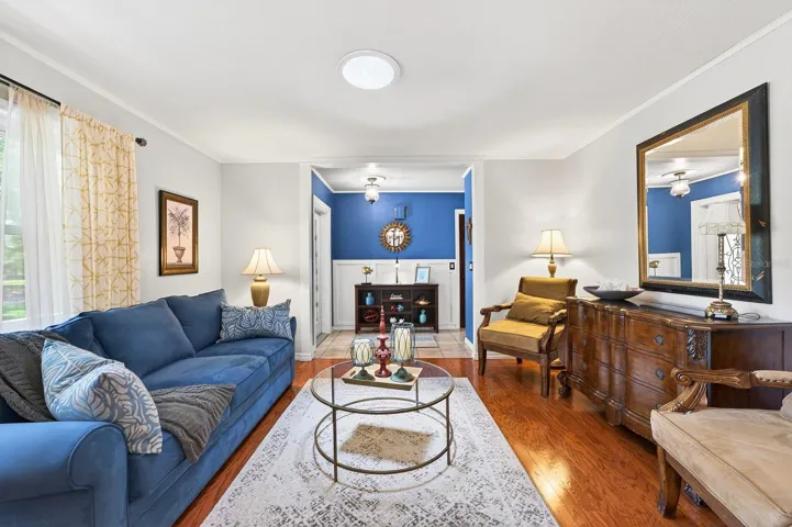 The foyer opens up into formal living and dining spaces with an easy flow into the kitchen and family room.