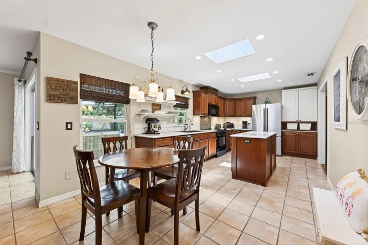 Kitchen offers a casual dining space.