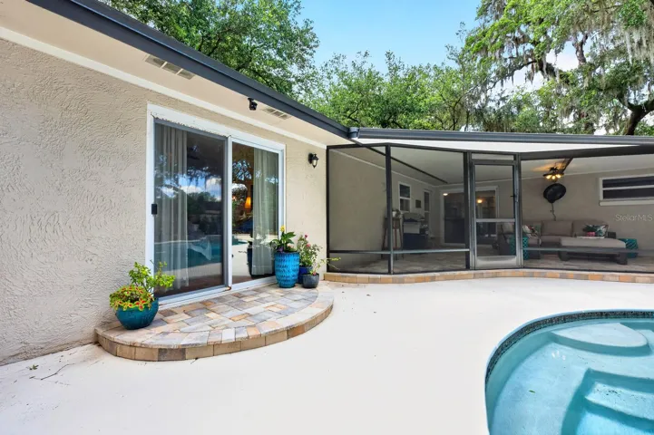 There are multiple access points to the pool/backyard.
