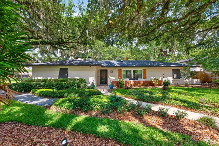 A rare find in the sought after Lake Charm area of Oviedo - this beautifully updated POOL HOME on a sprawling .34 ACRE ~ CORNER LOT with NO HOA, mature Oaks that steal the show, and the kind of space and privacy that make Mead Manor so special!